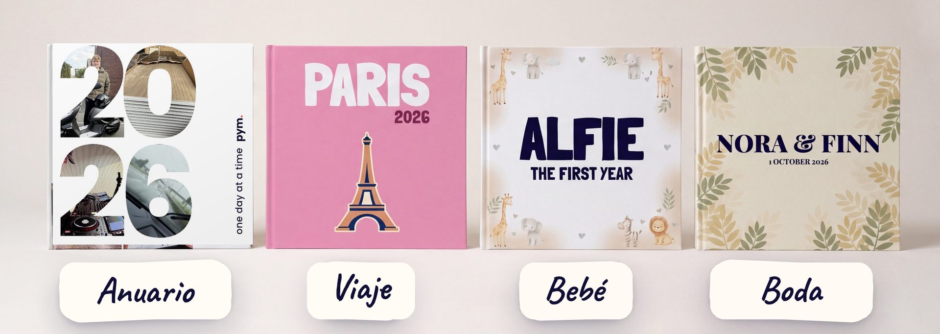 Cuatro libros PYM impresos en fila: un anuario 2026, un libro de viaje de París, un libro del bebé para Alfie y un libro de boda para Nora y Finn